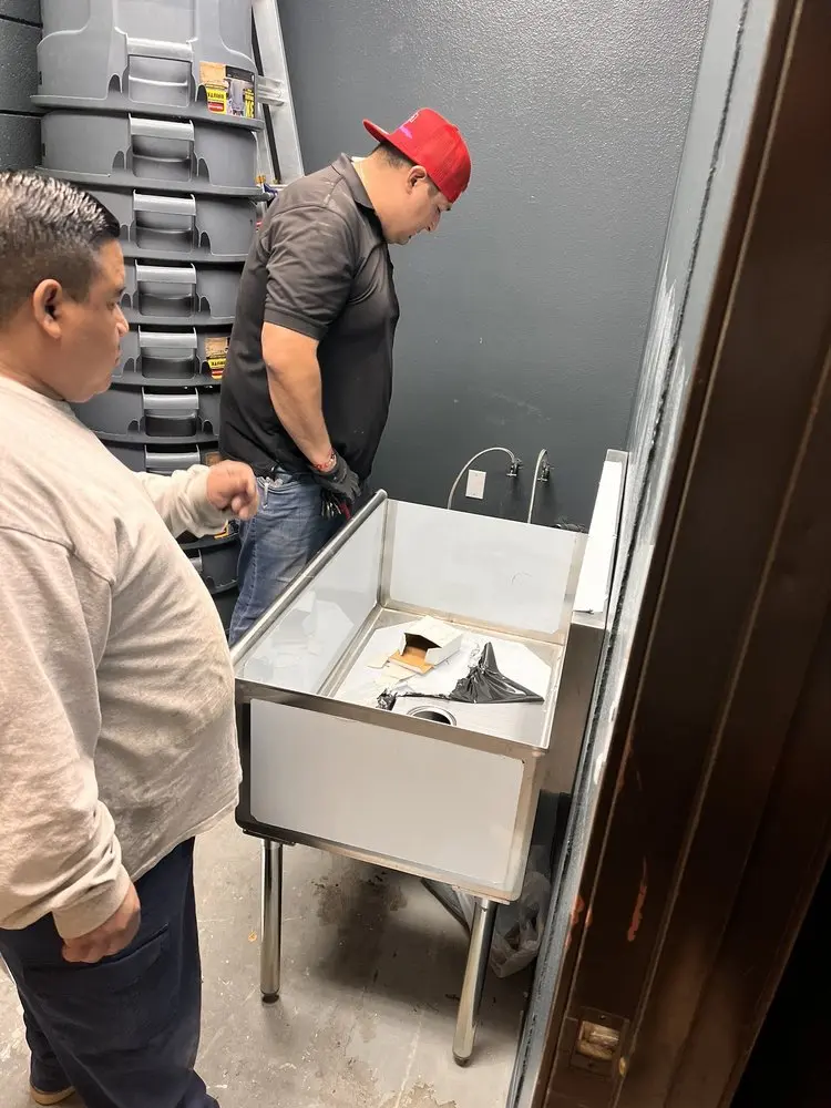 Commercial plumbing and sink installation in Elim